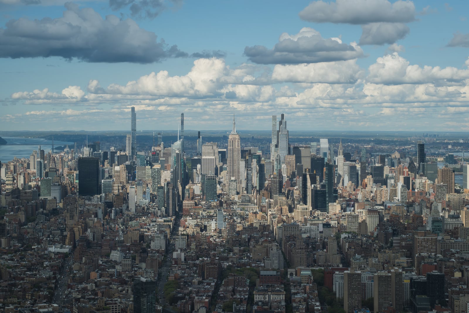 Midtown Manhattan skyline with the Empire State Building, viewed from One World Observatory in New York City.